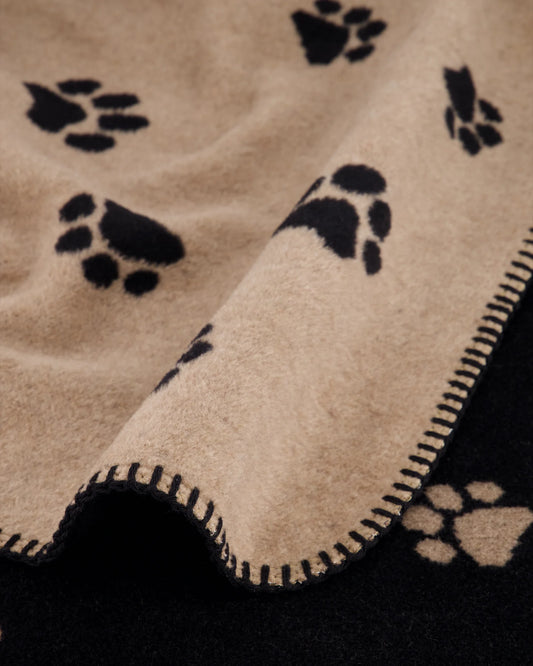 Wohndecke mit Pfoten Motiv in Schwarz/Beige